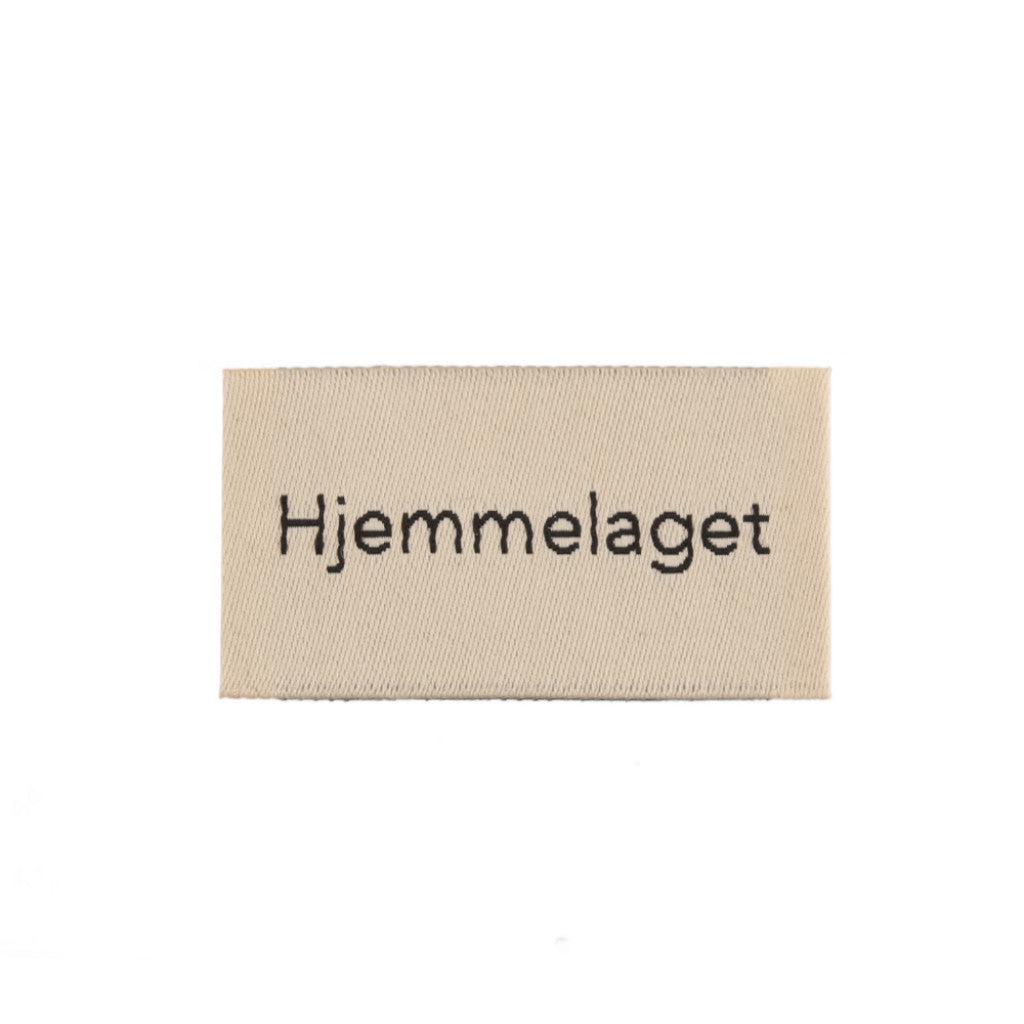 Merkelapp med tekst 25x45mm - Hjemmelaget
