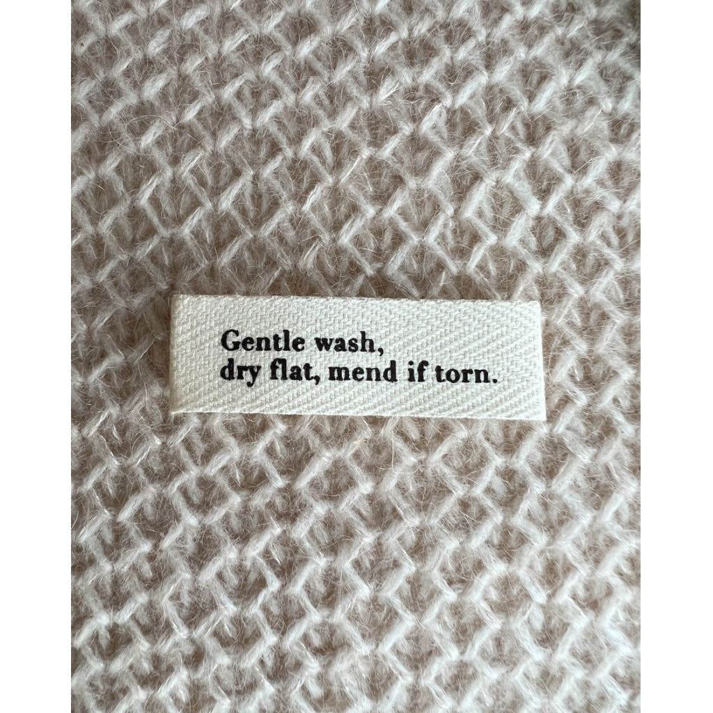 Symerke PetiteKnit - Gentle wash, dry flat, mend if torn.