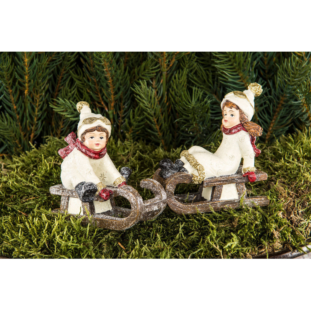 Barn i Slede på Pinne, Poly, 8cm - 1stk Assortert Design