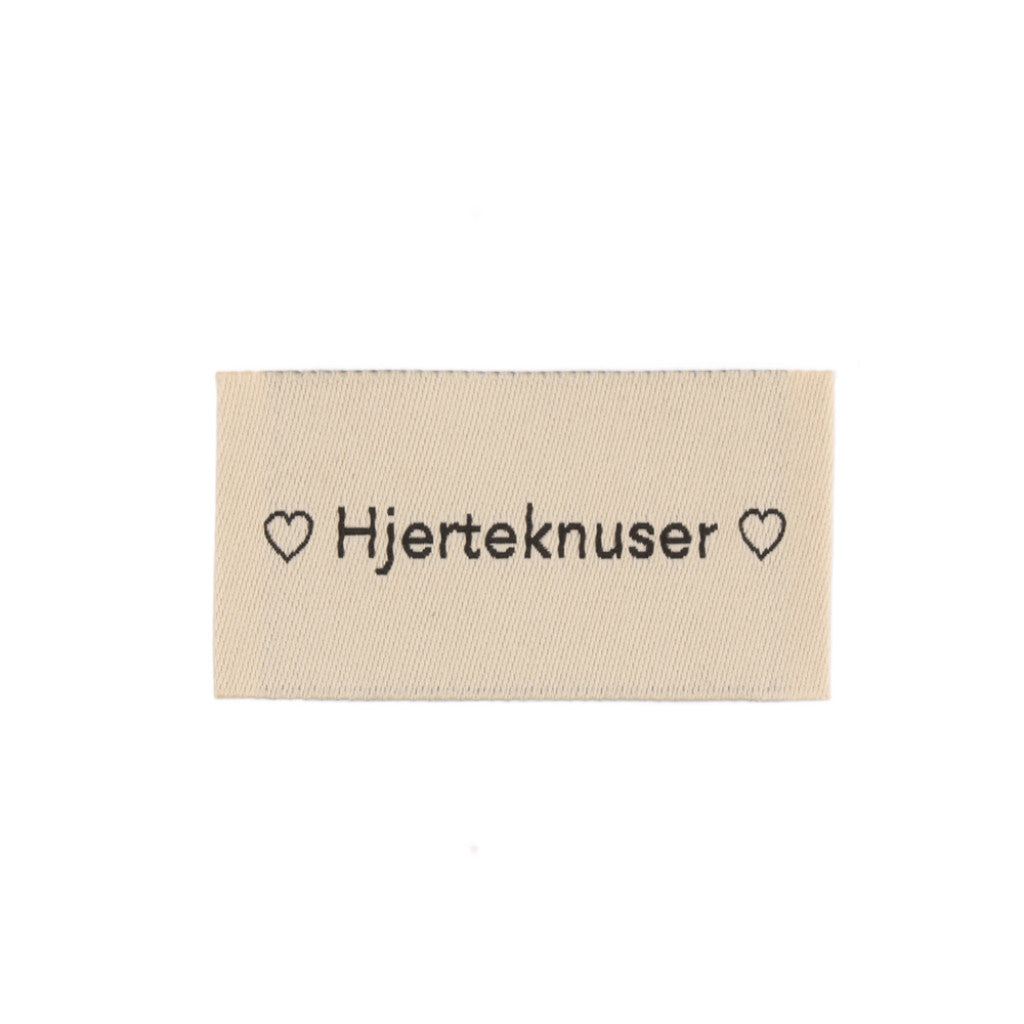 Merkelapp med tekst 25x45mm - Hjerteknuser