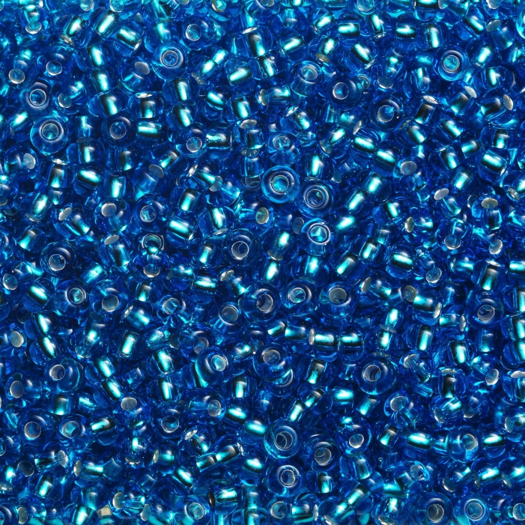 Rocaillesperle 9/0 - Turkis Halvtransparent